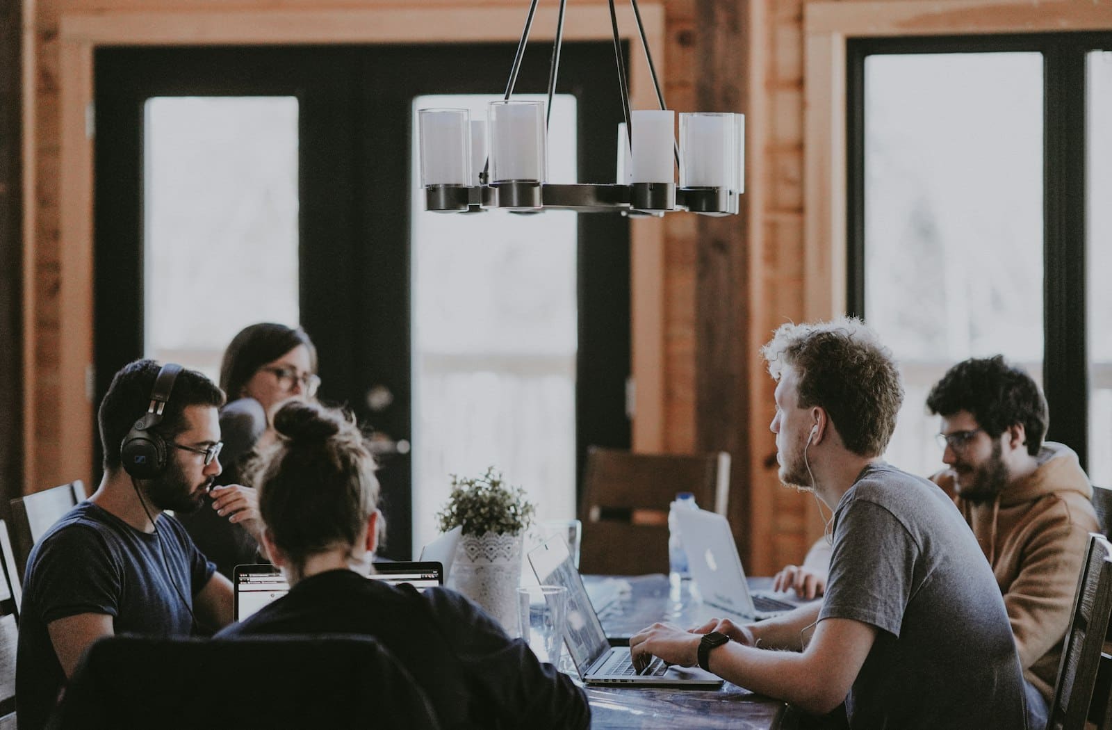 A team planning around a table